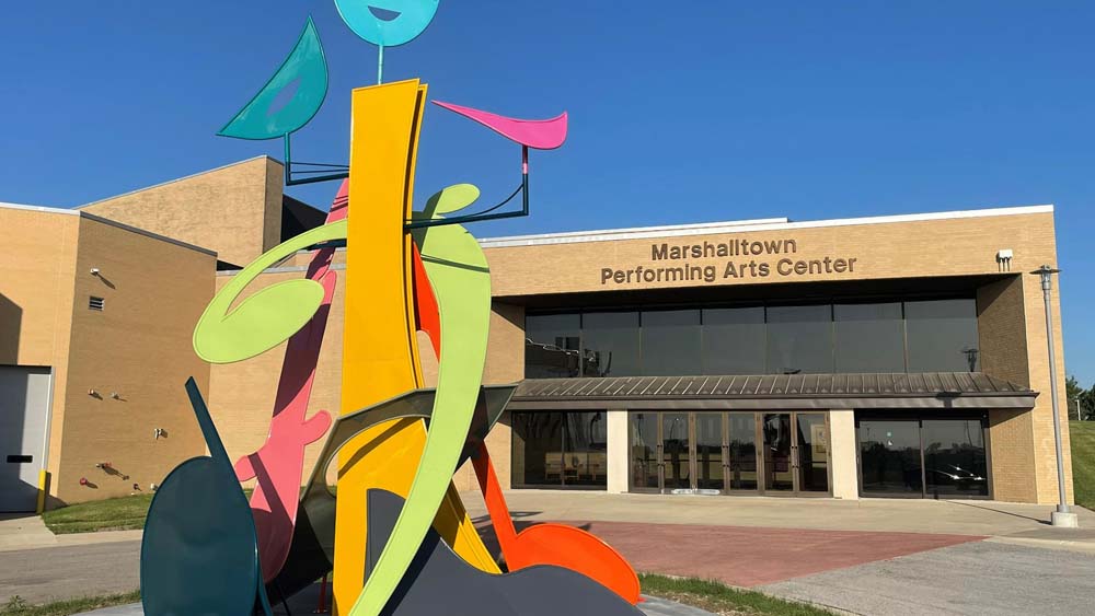 Scherzo colorful sculpture with musical shapes in front of the Marshalltown Performing Arts Center